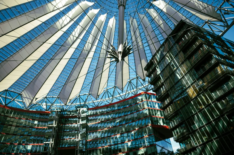 a picture of the inside of a building, inspired by Buckminster Fuller, lead - covered spire, buildings are flying, german, towering high up over your view