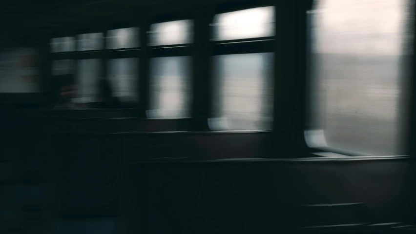 a blurry photo of the inside of a bus, unsplash contest winner, abstract expressionism, train window, shadowy and dark, on the ocean, trains