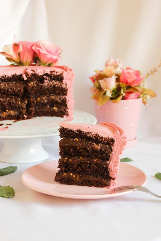 a close up of a piece of cake on a plate, pink flowers, fully chocolate, 3 - piece, side profile view