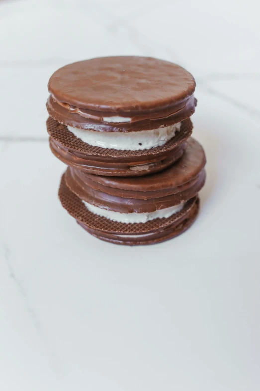 a stack of cookies sitting on top of a table, detailed product image, s'mores, 3/4 front view, lush