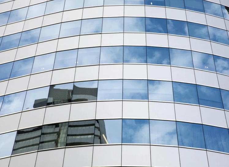 a clock that is on the side of a building, mirror and glass surfaces, curvy build, thumbnail, fan favorite