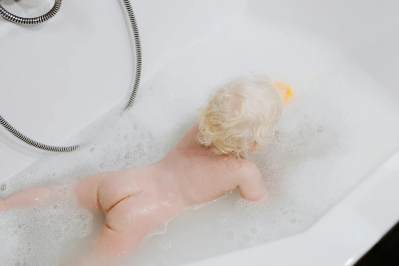 a doll laying in a bathtub filled with soap, pexels contest winner, albino dwarf, profile image, human babies, elegant high quality