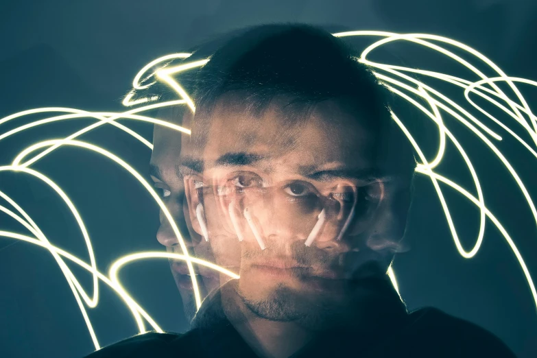 a man with angel wings on his face, by Adam Marczyński, pexels contest winner, generative art, glowing wires, looking towards camera, highly reflective, avatar image
