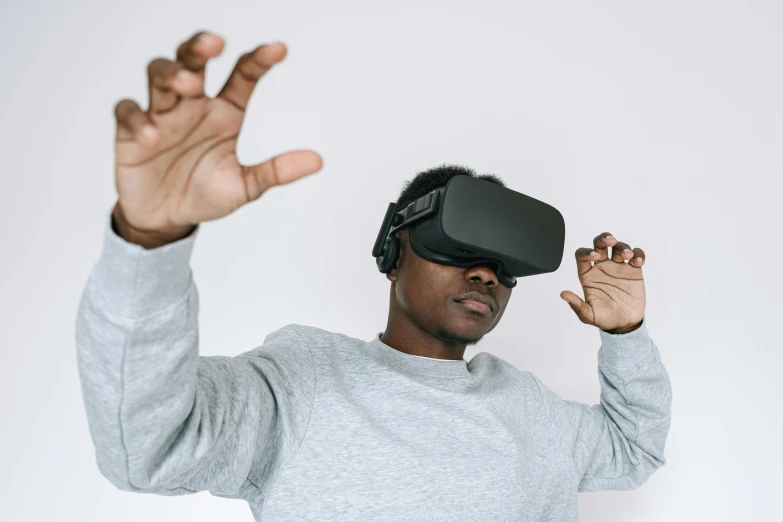 a man wearing a virtual reality headset, by Carey Morris, trending on pexels, afrofuturism, a man wearing a black jacket, left hand propping up the head, gamedev, avatar image