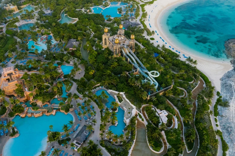 an aerial view of a resort in the middle of the ocean, slides, near crystal temple in atlantis, listing image, eye level shot