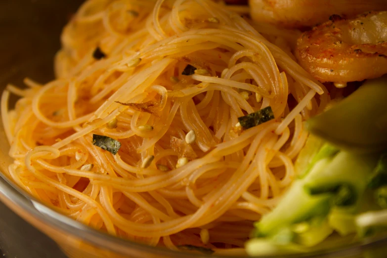 a bowl of pasta with shrimp and broccoli, a picture, by Adam Marczyński, close up of iwakura lain, yellow translucent lace, daopao, thumbnail
