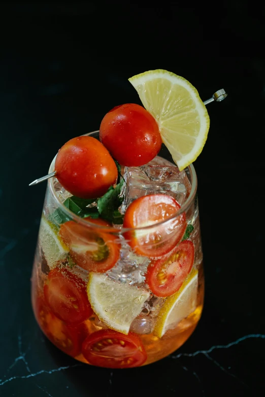 a close up of a drink in a glass on a table