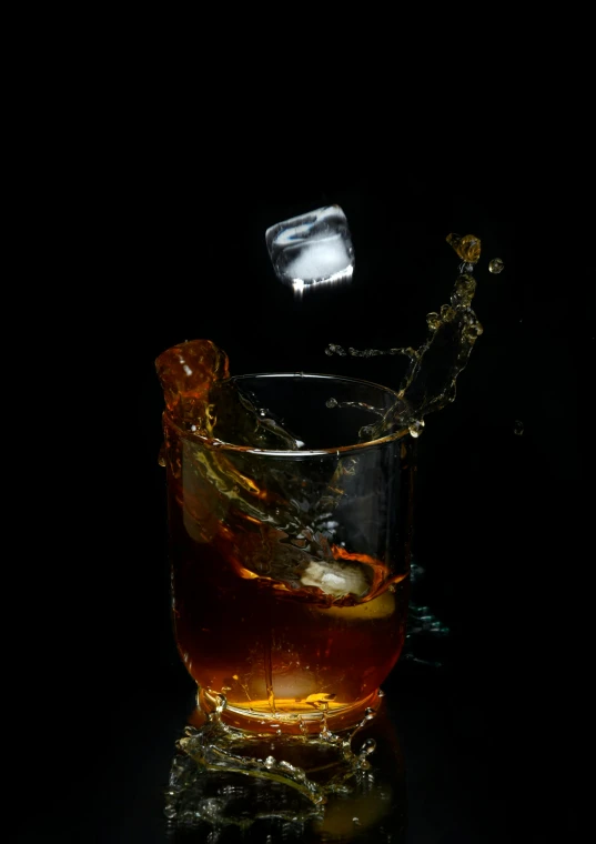 a glass filled with liquid sitting on top of a table, by Andrew Domachowski, unsplash, renaissance, whiskey glass with ice cubes, 15081959 21121991 01012000 4k, medium format, ilustration