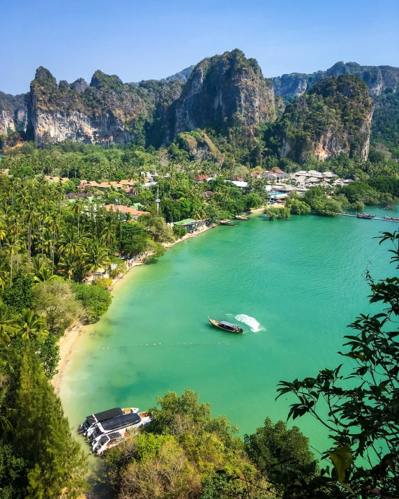 a large body of water surrounded by trees, inspired by Steve McCurry, pexels contest winner, thailand, beach is between the two valleys, square, today\'s featured photograph 4k