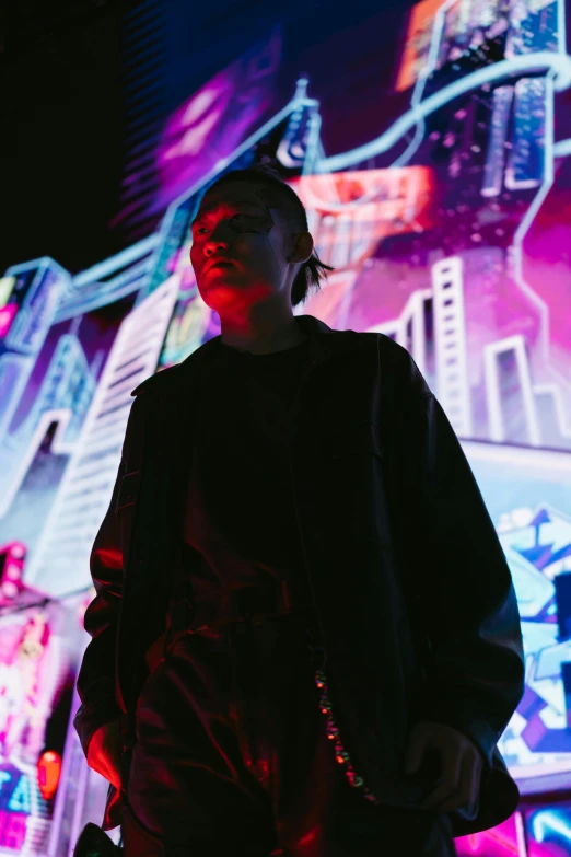 a man standing in front of a neon city, inspired by Liam Wong, unsplash, portrait a woman like reol, wearing japanese techwear, concert, ( ( theatrical ) )