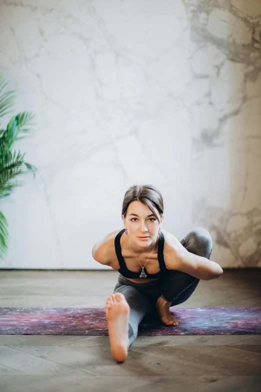 a woman doing a yoga pose on a yoga mat, a portrait, by Arabella Rankin, pexels contest winner, arabesque, squatting, anna nikonova aka newmilky, instagram story, sweat