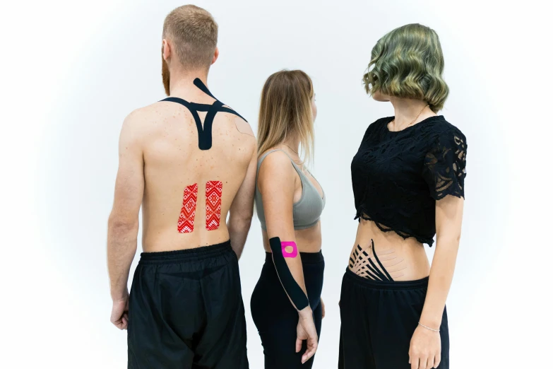 a group of people standing next to each other, a tattoo, motion capture system, profile image, smart textiles, temporary tattoo