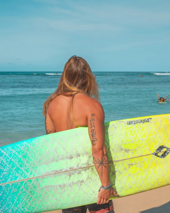 a man standing on top of a beach holding a surfboard, by Hannah Tompkins, pexels contest winner, graffiti, lower back of a beautiful woman, rainbow tubing, gif, zoomed out