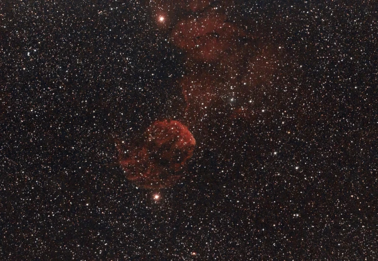 a star filled sky filled with lots of stars, by John Covert, glowing red skull, with a very large mouth, batoidea shape, 1 petapixel image