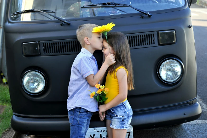 a boy and a girl kissing in front of a van, pixabay contest winner, ukraine. professional photo, 15081959 21121991 01012000 4k, flower power, mini model