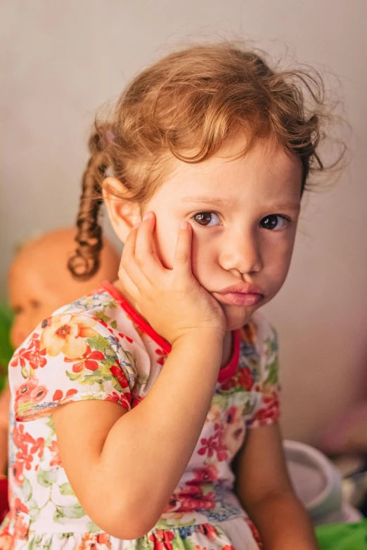 a little girl sitting on top of a bed, pexels, mannerism, noticeable tear on the cheek, slide show, ready to eat, worried