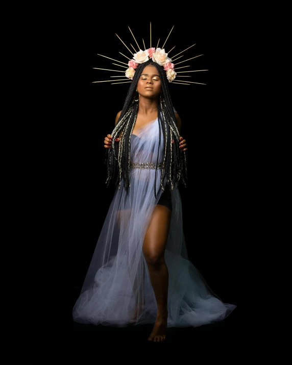 a woman in a blue dress with a crown on her head, an album cover, pexels contest winner, afrofuturism, npc with a saint\'s halo, full body photogenic shot, wearing a light grey crown, bathed in light