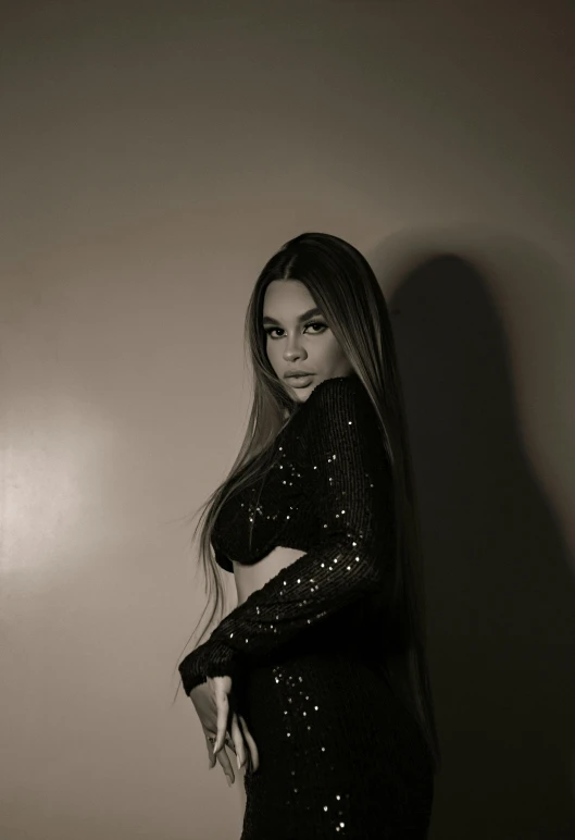 a black and white photo of a woman in a dress, an album cover, instagram, sofia vergara, vanessa morgan, photograph taken in 2 0 2 0, dark. no text