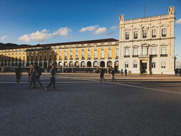 a group of people that are standing in the street, pexels contest winner, neoclassicism, the city of lisbon, squares, 🚿🗝📝, profile image