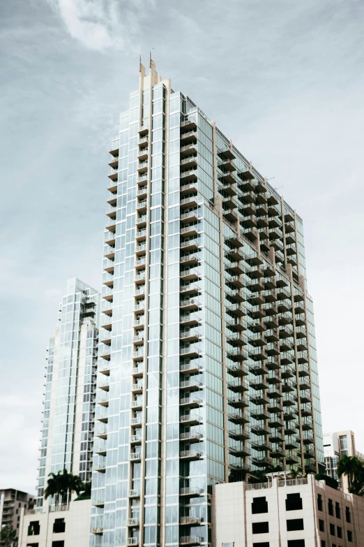 a very tall building with a lot of windows, a digital rendering, by Carey Morris, unsplash, settlement, frontal view, 8k ”, pristine and clean