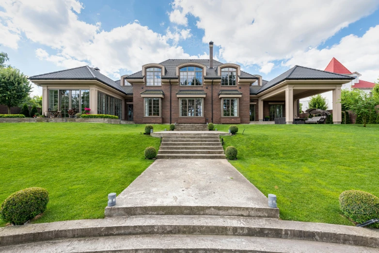 a large house sitting on top of a lush green field, an album cover, pexels contest winner, luxury materials, driveway, 3 / 4 view from back, highly detailed hdr