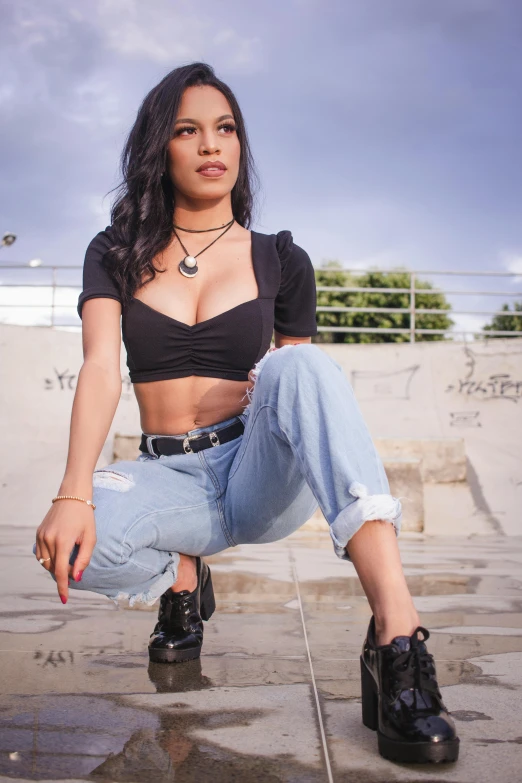 a woman sitting on the ground with her legs crossed, trending on pexels, renaissance, wearing a sexy cropped top, with black hair, kawaii shirt and jeans, standing