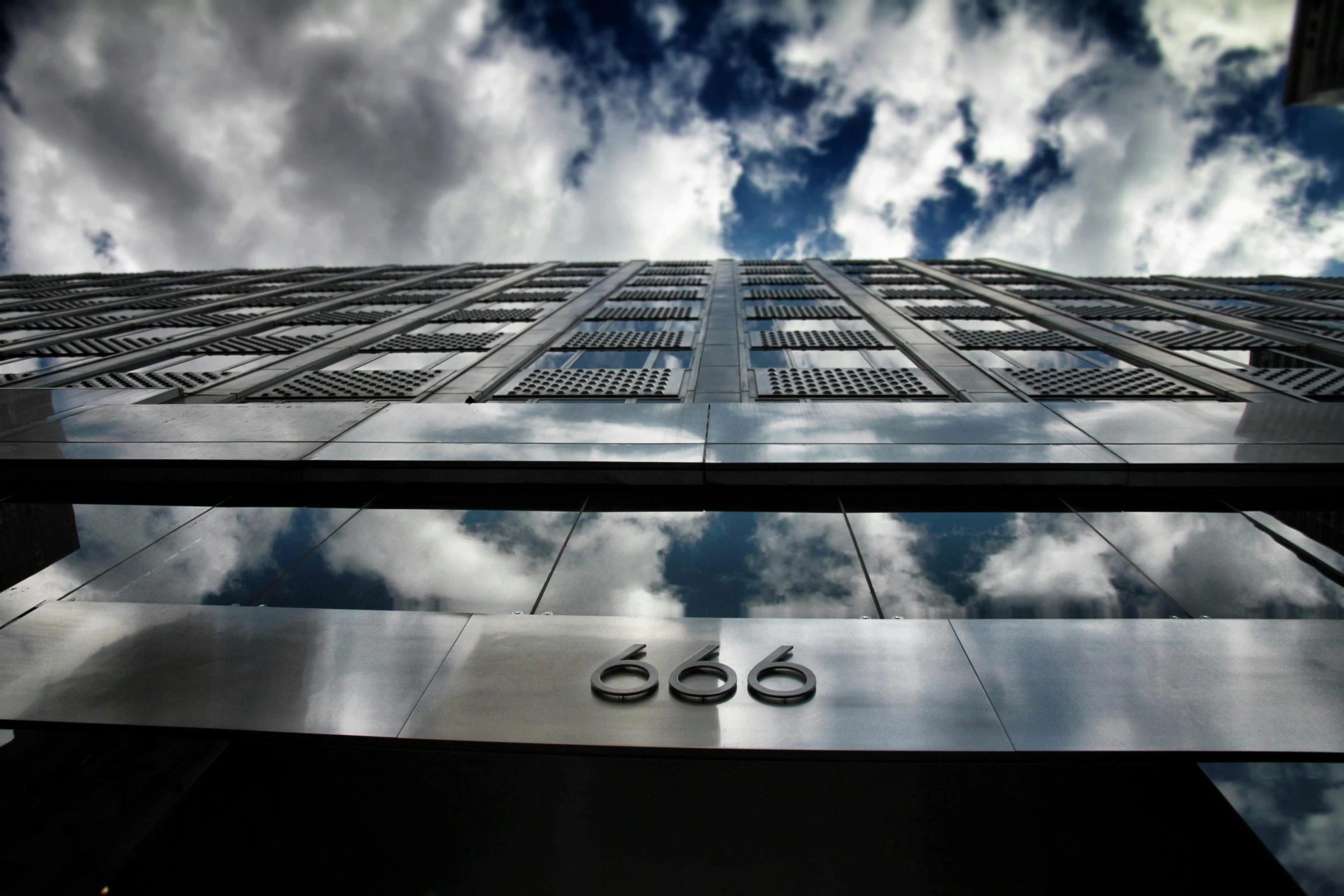 a tall building with a sky in the background, an album cover, by Andor Basch, unsplash, captured on canon eos r 6, cloud day, hdri, on a bright day