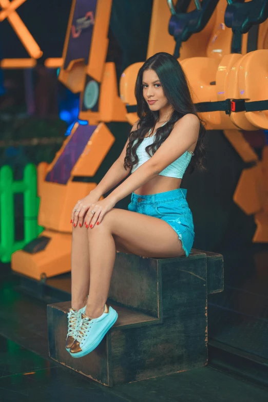 a woman sitting on top of a wooden bench, posing for a picture, neon lights in the background, dressed in a top and shorts, avatar image