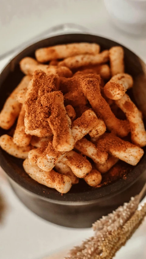 a close up of a bowl of food on a table, cinnamon, thumbnail, puffs of smoke, full product shot