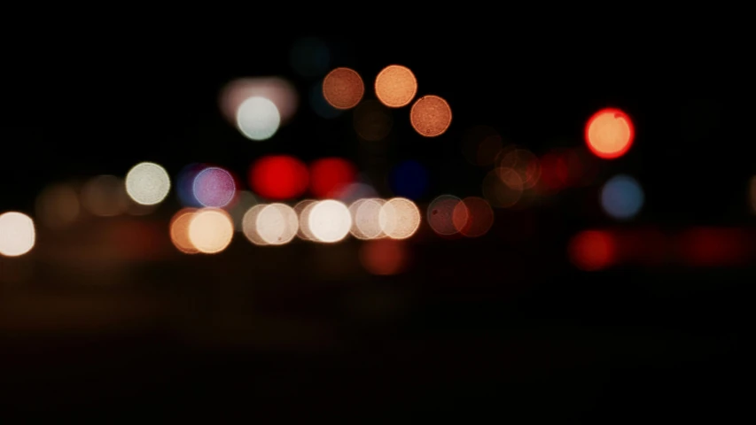 a blurry photo of a city street at night, a picture, unsplash, hurufiyya, macro bokeh ”, overcast bokeh - c 5, multicolored