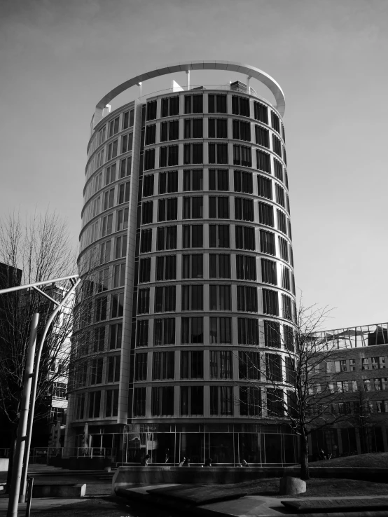 a black and white photo of a building, by Mathias Kollros, flickr, hannover, circular, wim crouwel, office