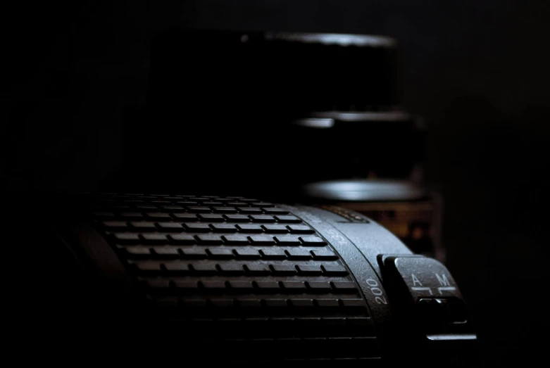 a close up of a camera lens on a table, a macro photograph, by Adam Marczyński, art photography, hasselblad medium format, military photography, cinematic-shot, medium format