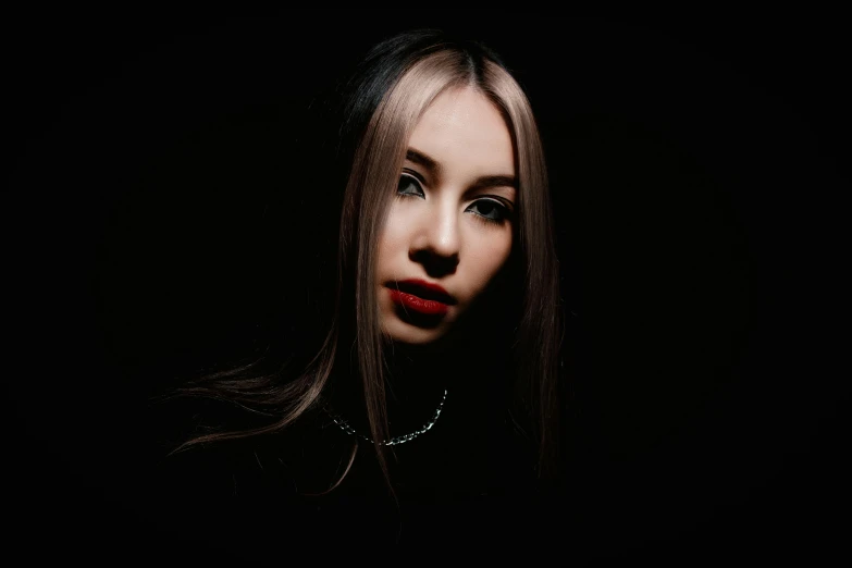 a woman with long hair and red lipstick, inspired by Elsa Bleda, trending on pexels, antipodeans, in a pitch black room, ava max, 4k symmetrical portrait, maxim sukharev