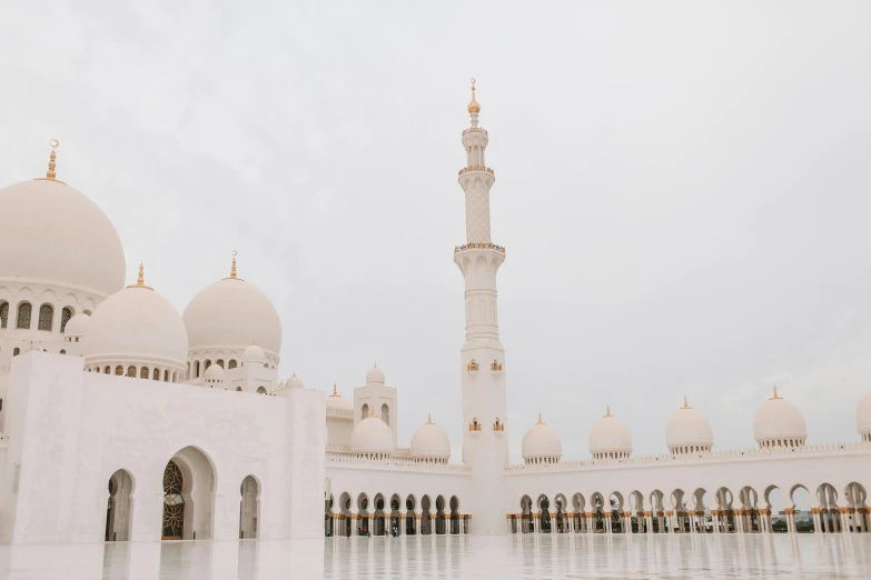 a group of people standing in front of a white building, islamic architecture, unsplash photography, fan favorite, three towers