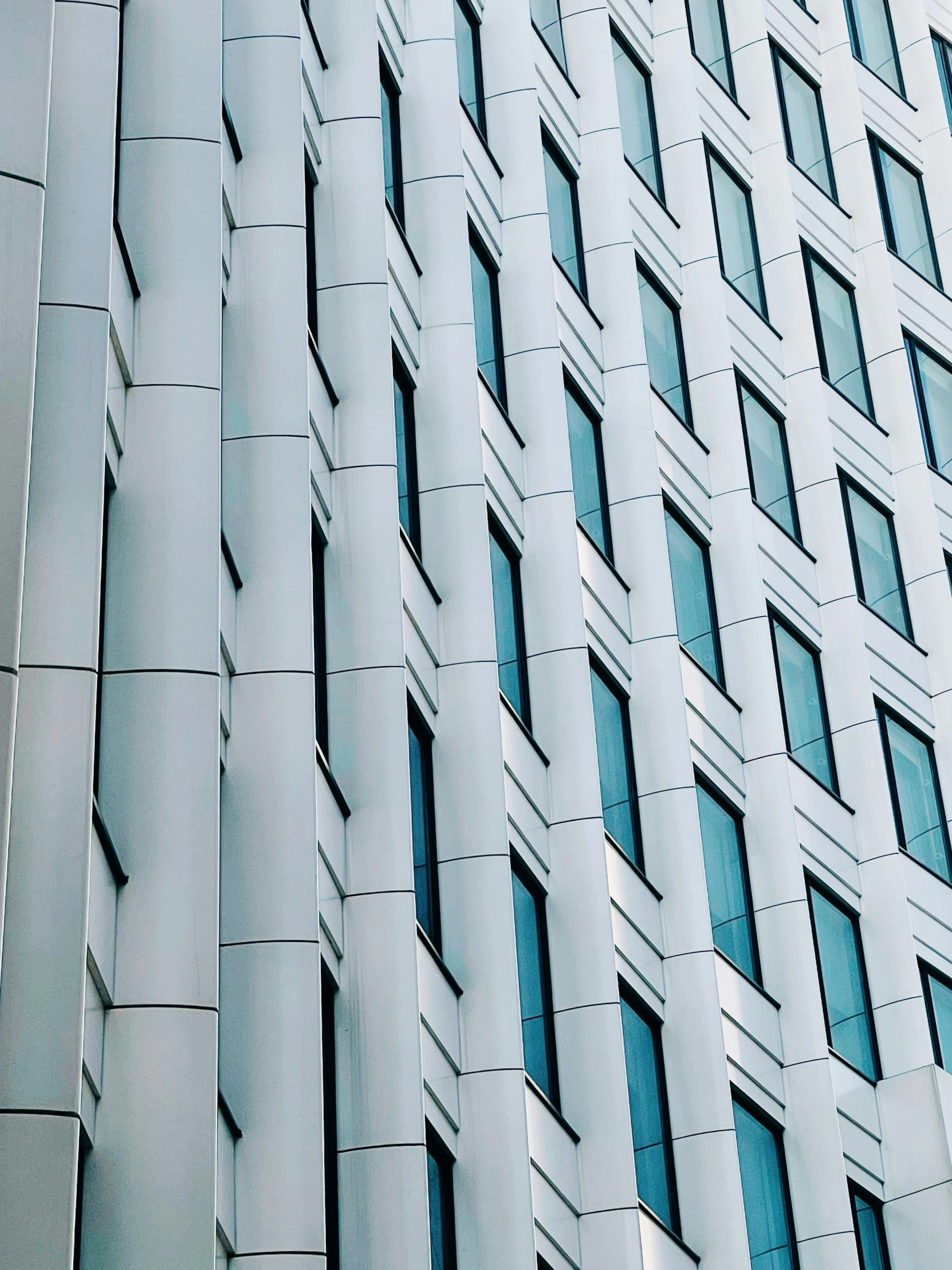 a close up of a building with many windows, pexels contest winner, white panels, thumbnail, square lines, high quality image