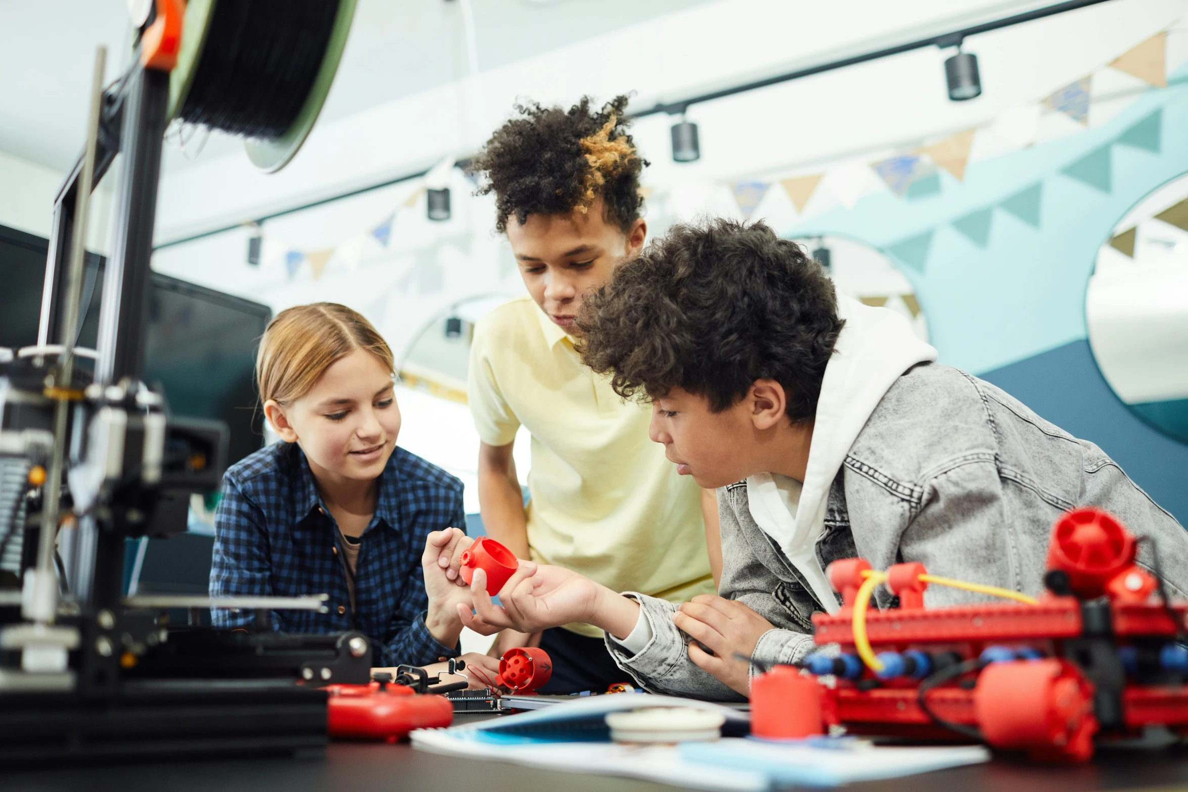 a group of children playing with legos in a classroom, pexels contest winner, renaissance, red and black robotic parts, avatar image, teenage boy, 3 d filament