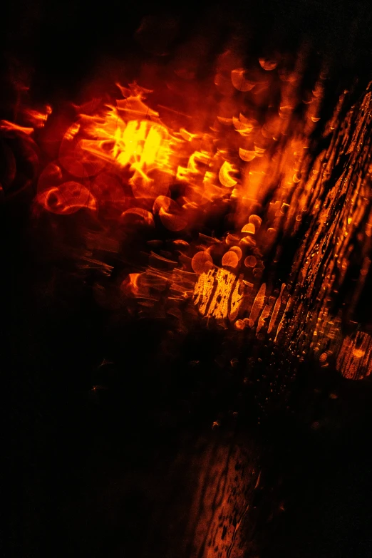 a close up of a street light at night, an album cover, inspired by Elsa Bleda, lyrical abstraction, lava waterfalls, liquid translucent amber, in hell, black and orange