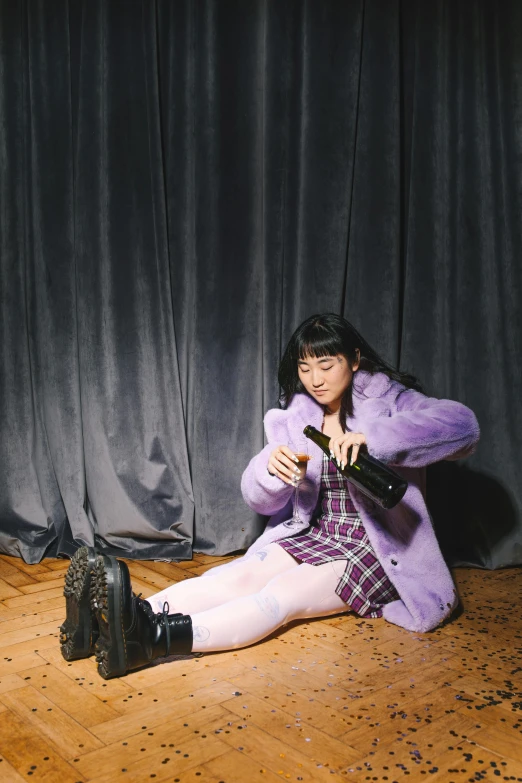 a woman sitting on the floor holding a bottle of wine, melanie martinez, jackie tsai style, standup comedian, ((purple))