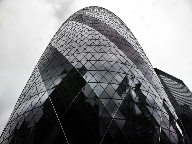 a black and white photo of a very tall building, inspired by Zaha Hadid, pexels contest winner, an egg, a brightly coloured, london, glass cover