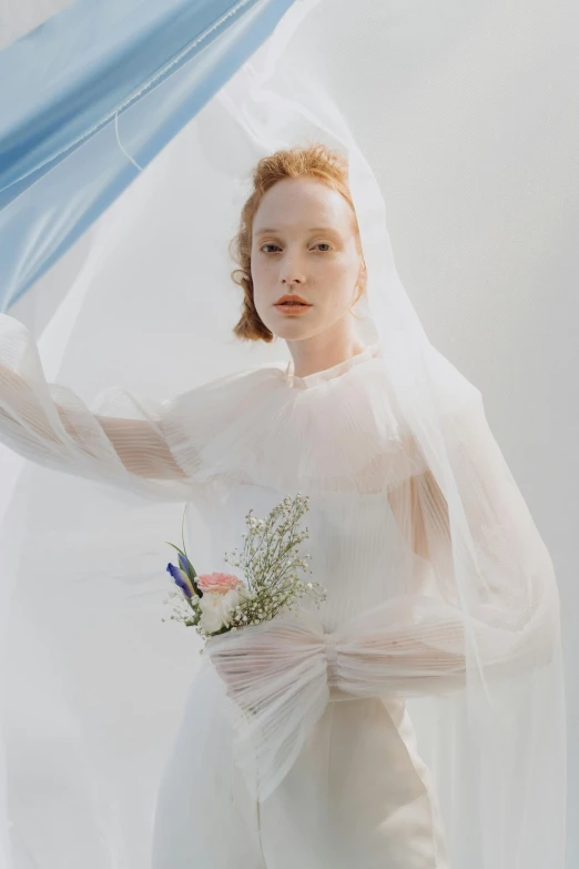 a woman in a wedding dress holding a bouquet, an album cover, by Sara Saftleven, sadie sink, haute couture fashion shoot, wearing a veil, ignant