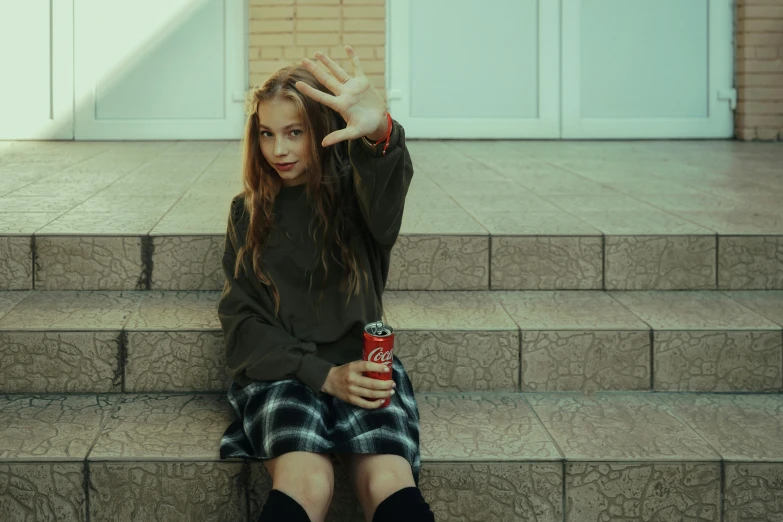 a woman sitting on the steps of a building, pexels contest winner, hyperrealism, soda themed girl, middle finger, young girls, ( ( theatrical ) )