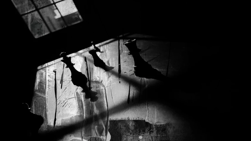 a black and white photo of a window in a building, inspired by Katia Chausheva, shadows screaming, things hanging from ceiling, cracked, 15081959 21121991 01012000 4k