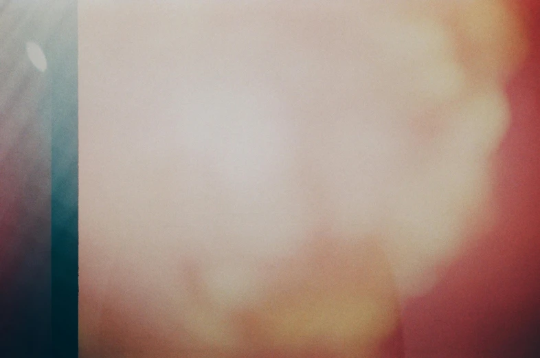 a close up of a clock on a pole, an album cover, by Gerhard Richter, lyrical abstraction, the sky is a faint misty red hue, gradient brown to white, pink smoke, agnes pelton