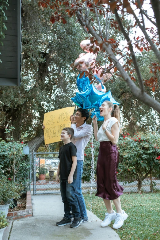 a group of people standing on top of a sidewalk, holding a balloon, alex flores, neighborhood themed, carson ellis