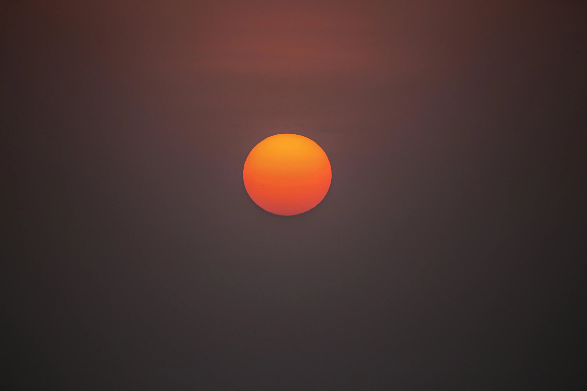 the sun is setting in the dark sky, a picture, pexels contest winner, minimalism, digital yellow red sun, very smoky, diffused, orange: 0.5
