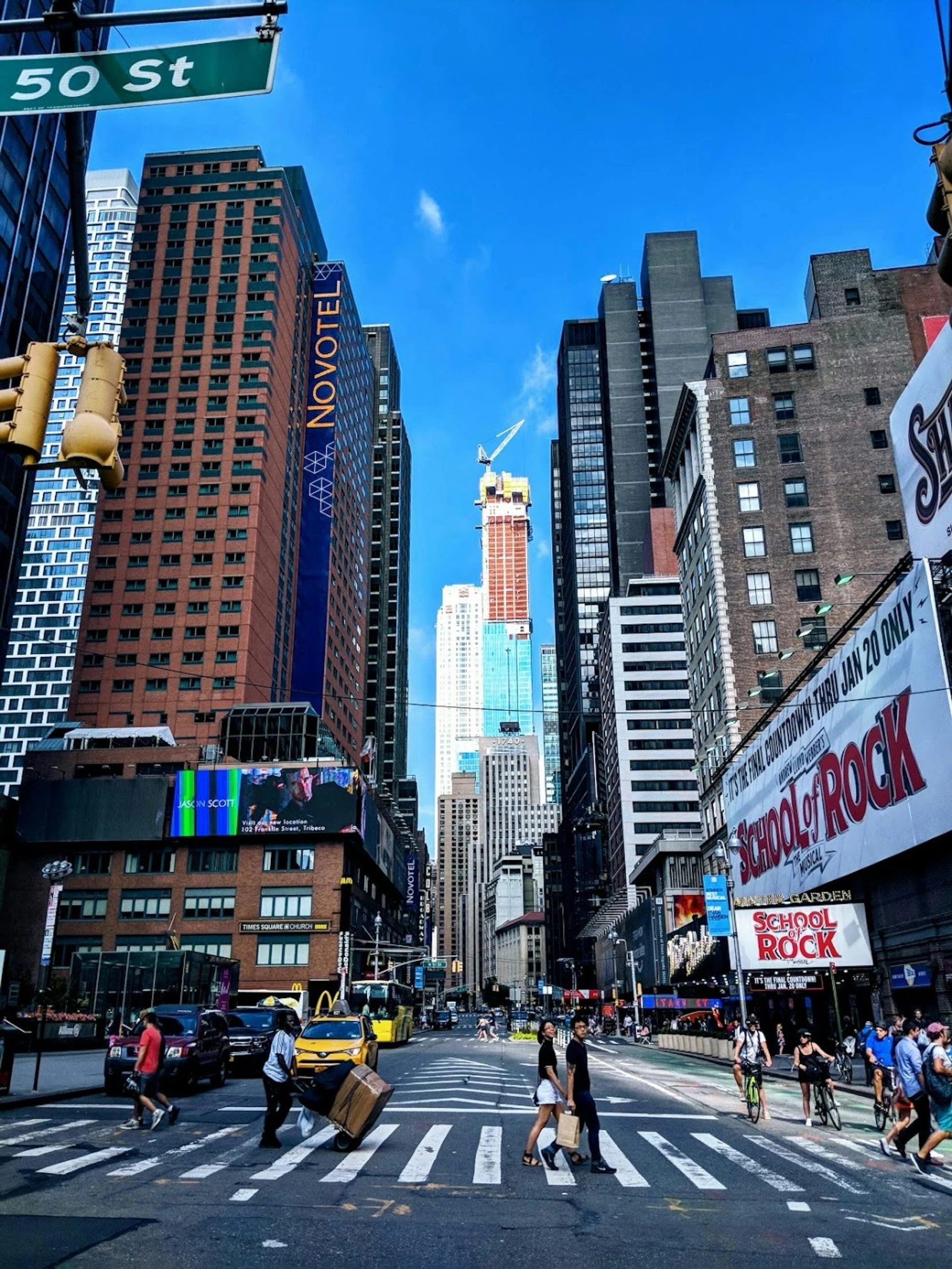 a city street filled with lots of tall buildings, a picture, billboard image, vacation photo, street of new york, slide show