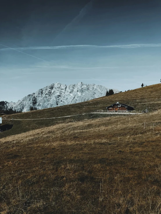 a group of people standing on top of a grass covered hillside, by Sebastian Spreng, pexels contest winner, renaissance, chairlifts, 4 k cinematic panoramic view, alpine landscape with a cottage, slide show