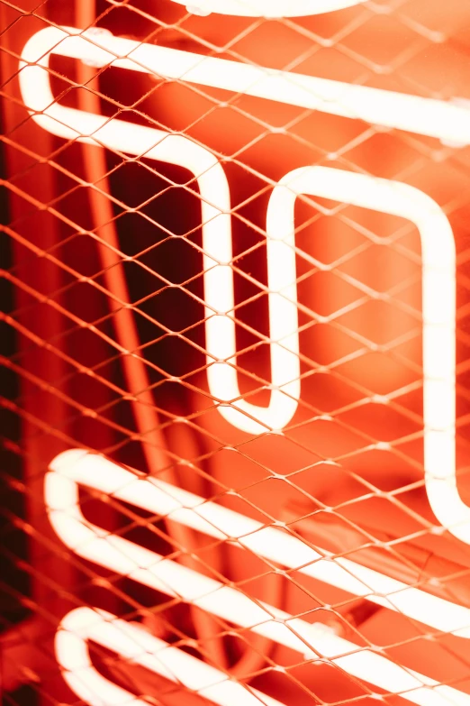 a close up of a neon sign on a building, net art, red and orange glow, digital image, fan favorite, mesh wire