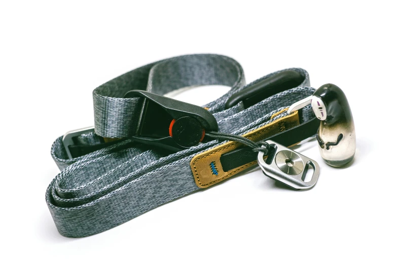 a close up of a camera strap on a white background, bauhaus, blue - grey gear, collar and leash, denim, thumbnail