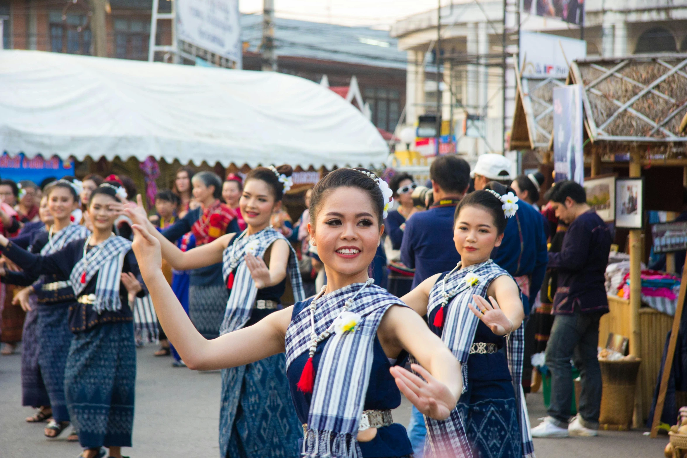 a group of women standing on top of a street, pexels contest winner, dau-al-set, sukhothai costume, avatar image, other women dancing behind, banner